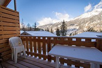 Demi Chalets Le Petit Bonheur - balkon met tafel